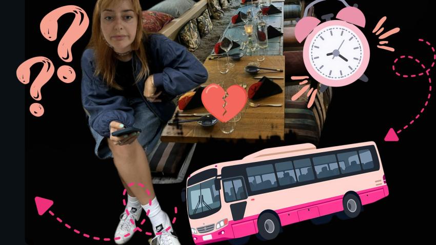 Eine Frau sitzt an einem leeren Tisch und wartet.