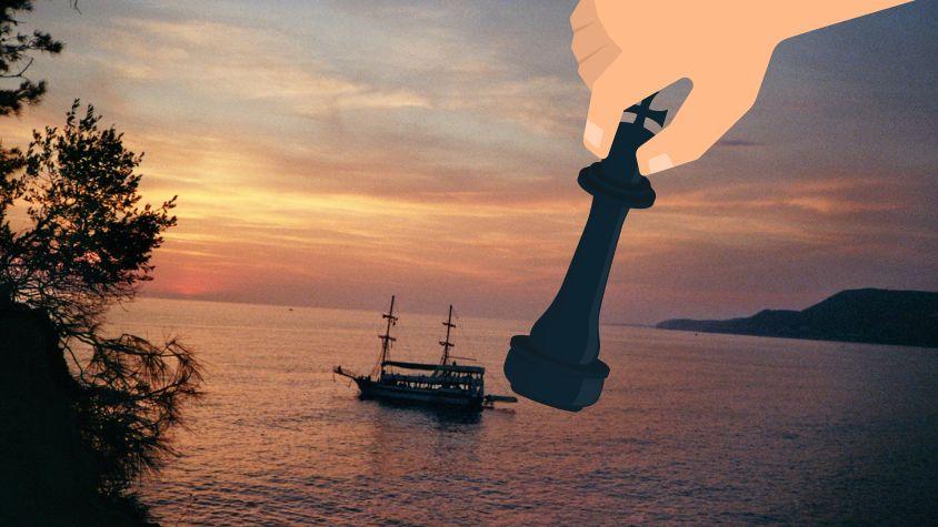 Ein Schiff wird von einer Schachfigur "geschlagen"