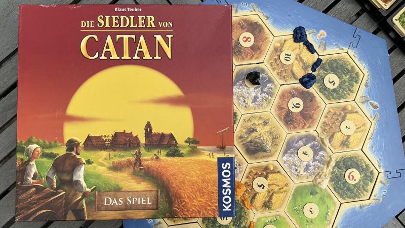 Spiele-Karton von dem Spiel Catan-Das Spiel