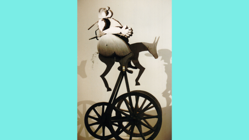 Esel mit Reiter, auf Rädern befestigt.